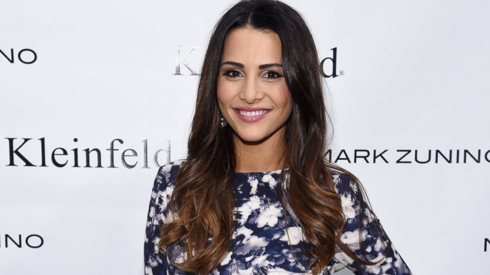 PHOTO: Andi Dorfman attends front row at The Mark Zunino For Kleinfeld 2015 Runway Show on Oct. 14, 2014 in New York City.  