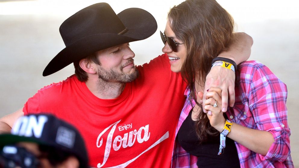 Ashton Kutcher, left, and Mila Kunis, right, attend Stagecoach: California's Country Music Festival on April 25, 2014 in Indio, Calif.  