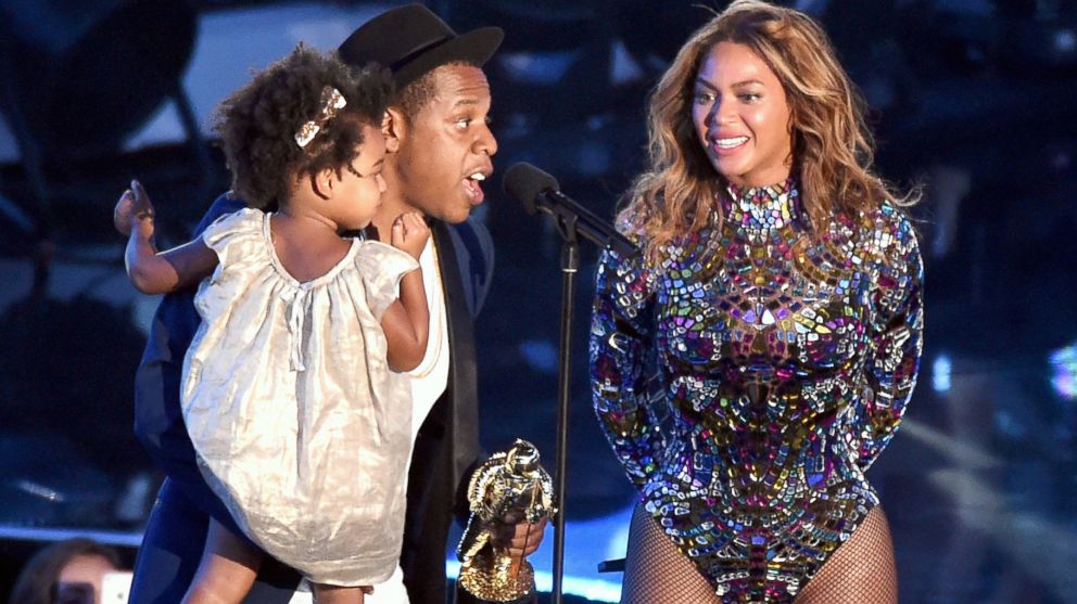 Jay-Z and daughter Blue Ivy Carter present the Michael Jackson Video Vanguard Award to honoree Beyonce onstage during the 2014 MTV Video Music Awards at The Forum, Aug. 24, 2014, in Inglewood, Calif. 