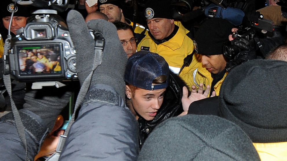 In this file photo, Justin Bieber appears at a police station in connection with an alleged criminal assault on Jan. 29, 2014 in Toronto, Canada.  
