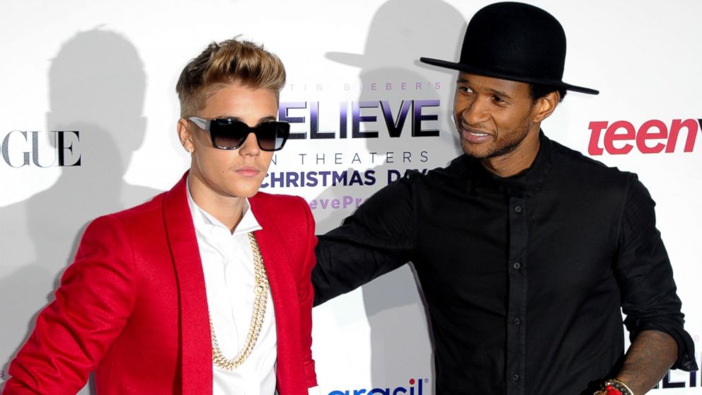 Justin Bieber and Usher attend the premiere of Open Road Films' 'Justin Bieber's Believe' at Regal Cinemas L.A. Live, Dec. 18, 2013, in Los Angeles.