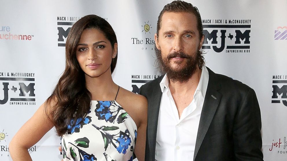 Camila Alves and husband Matthew McConaughey pose on the red carpet during the Mack, Jack & McConaughey charity gala at ACL Live, April 16, 2015, in Austin.