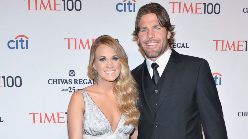 Honoree Carrie Underwood, left, and husband Mike Fisher attend the TIME 100 Gala, TIME's 100 most influential people in the world, at Jazz at Lincoln Center on April 29, 2014, in New York City.  