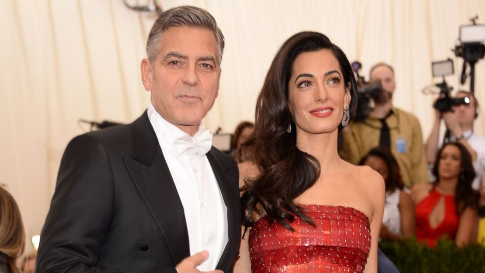 Amal Clooney, right, and George Clooney, left, attend the "China: Through The Looking Glass" Costume Institute Benefit Gala at Metropolitan Museum of Art on May 4, 2015 in New York City.  