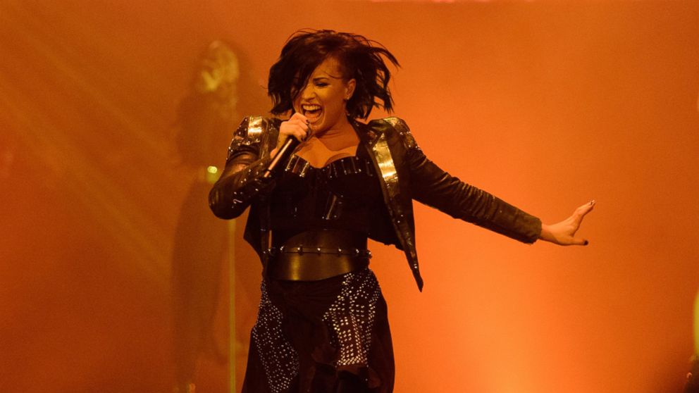 Demi Lovato performs on stage at United Center, Oct. 14, 2014, in Chicago.