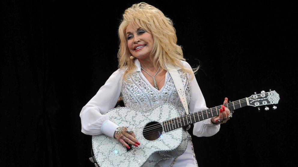 Dolly Parton performs on the Pyramid stage during day three of the Glastonbury Festival at Worthy Farm in Pilton in this June 29, 2014, file photo in Glastonbury, England. 