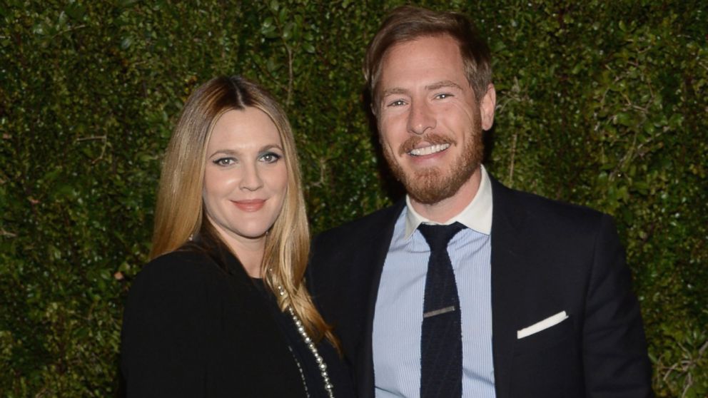 Drew Barrymore and her husband, Will Kopelman, attend the Chanel Celebration of the release of Drew Barrymore's photo book, "Find It in Everything," at Chanel Boutique, Jan. 14, 2014 in Beverly Hills, California.
