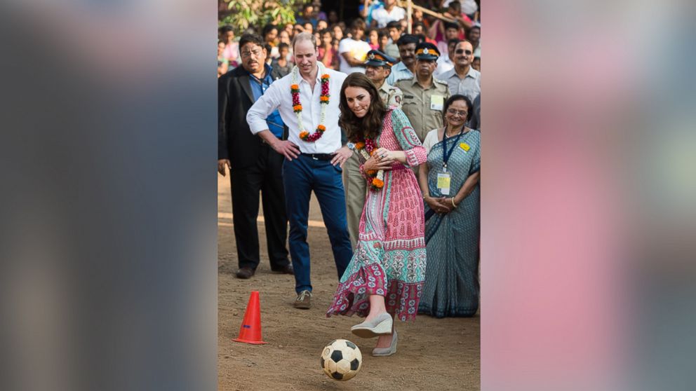 PHOTO: Catherine, Duchess of Cambridge and Prince William, Duke of Cambridge play football during a visit to the Banganga community on April 10, 2016 in Mumbai, India. 