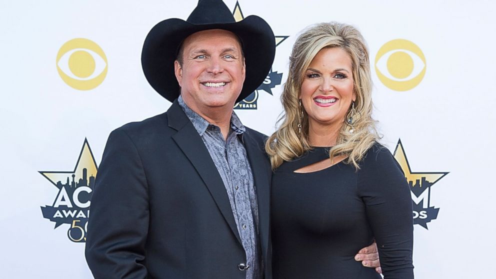 Garth Brooks, left, and Trisha Yearwood, right, are pictured on April 19, 2015 in Arlington, Texas.  