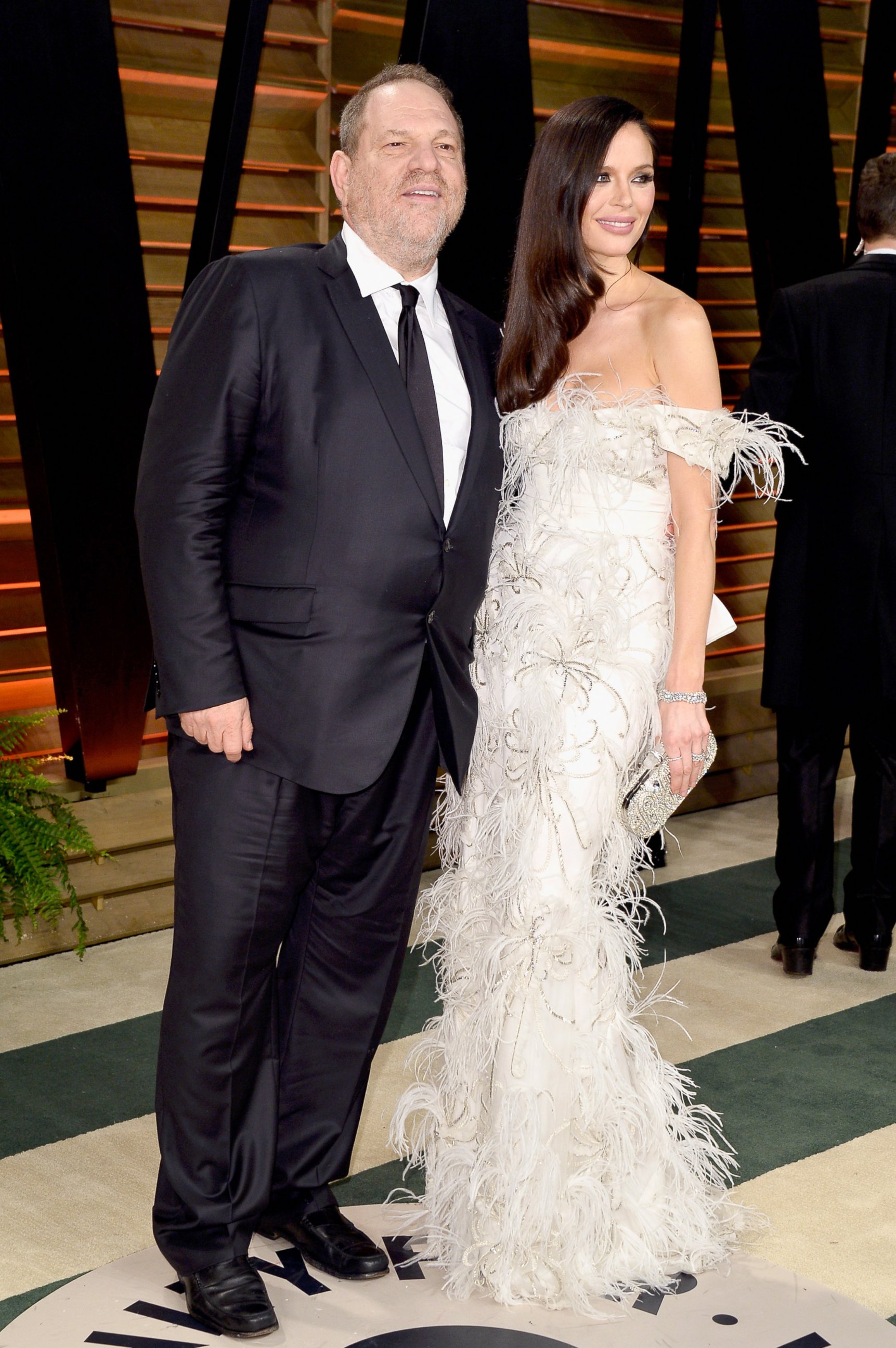 PHOTO: Studio executive Harvey Weinstein and fashion designer Georgina Chapman attends the 2014 Vanity Fair Oscar Party hosted by Graydon Carter on March 2, 2014. 