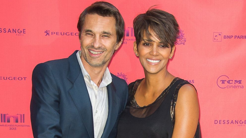 Halle Berry (R) and Olivier Martinez attend the 'Toiles Enchantees' Red Carpet as part of the Champs Elysees Film Festival 2013 at Publicis Champs Elysees on June 13, 2013 in Paris.  