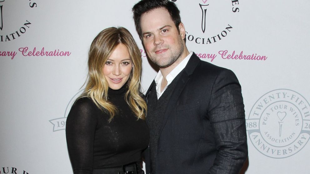 In this file photo, Hilary Duff, left, and Mike Comrie, right, are pictured on Feb. 11, 2013 in Santa Monica, Calif. 
