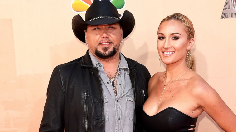 Recording artist Jason Aldean and Brittany Kerr arrive at the iHeartRadio Music Awards, March 29, 2015, in Los Angeles. 