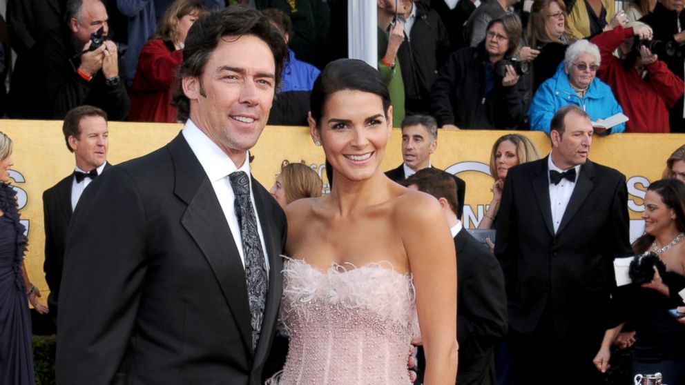 Jason Sehorn and Angie Harmon arrive at the 17th Annual Screen Actors Guild Awards at the Shrine Exposition Center, in this Jan. 30, 2011 file photo, in Los Angeles.