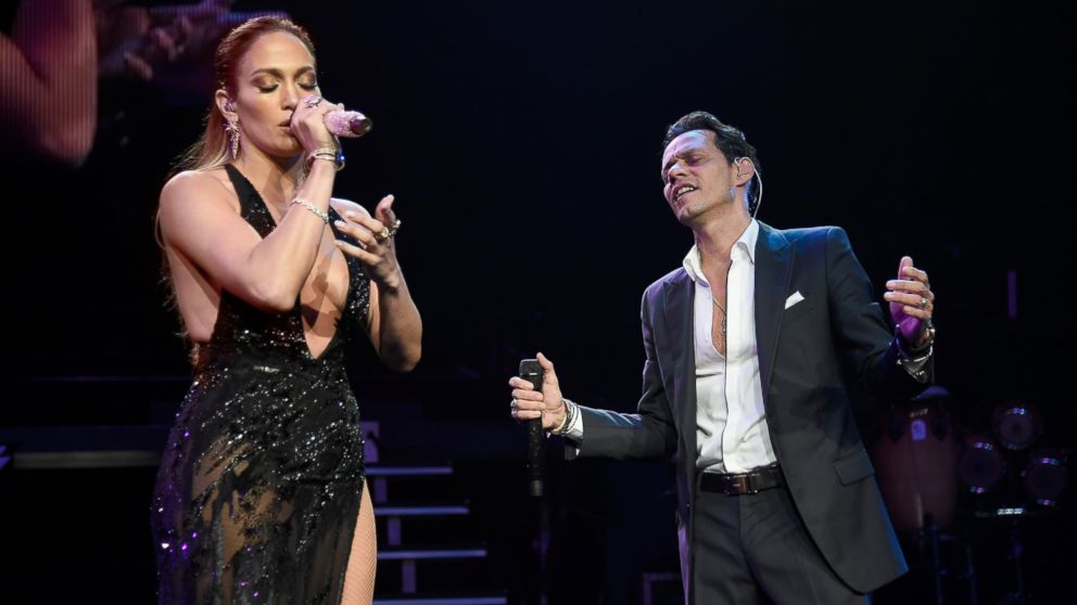 Jennifer Lopez (L) performs onstage with Marc Anthony at Radio City Music Hall, Aug. 27, 2016 in New York City. 