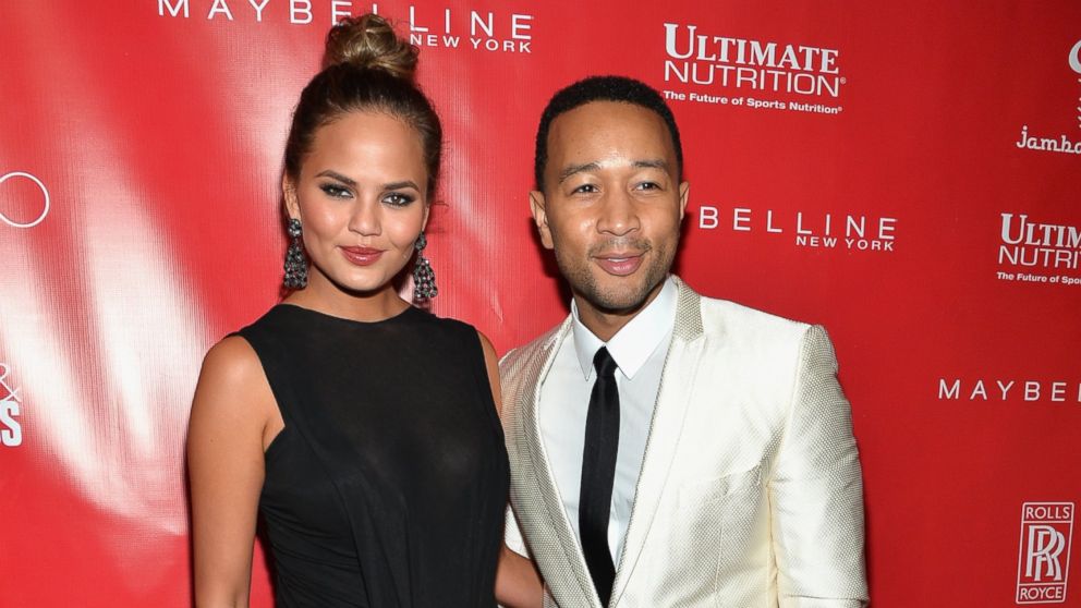 PHOTO: Chrissy Teigen, left, and John Legend, right, are pictured at the Shape & Men's Fitness kickoff party on Jan. 31, 2014 in New York City.  