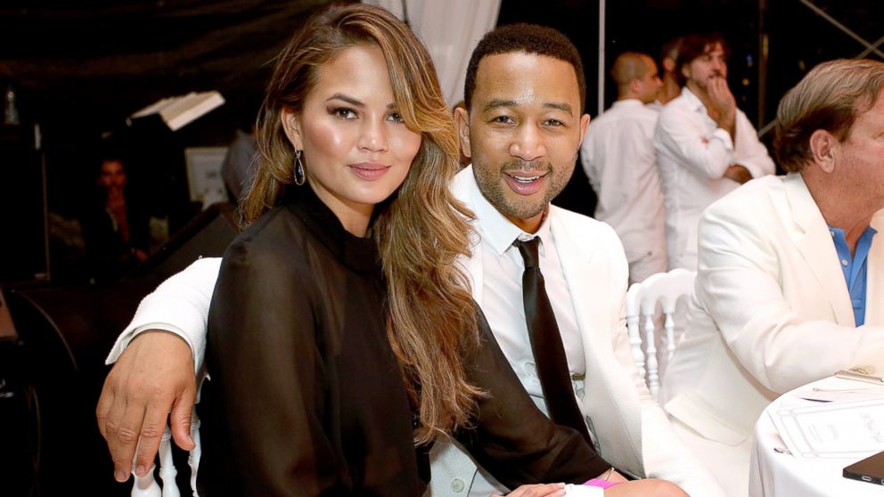 Chrissy Teigen and John Legend attend the white party dinner hosted by Andrea and Veronica Bocelli celebrating Fight Night In Italy benefiting the Andrea Bocelli Foundation and The Muhammad Ali Parkinson Center, Sept. 5, 2014, in Florence, Italy.