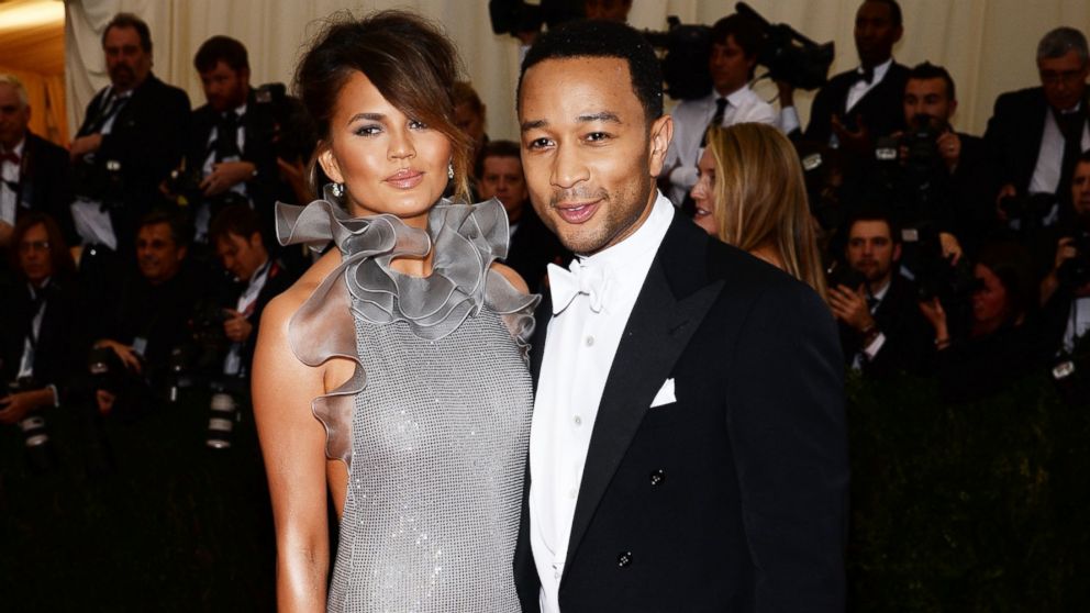 Chrissy Teigen, left, and John Legend, right, attend the "Charles James: Beyond Fashion" Costume Institute Gala at the Metropolitan Museum of Art on May 5, 2014 in New York City. 