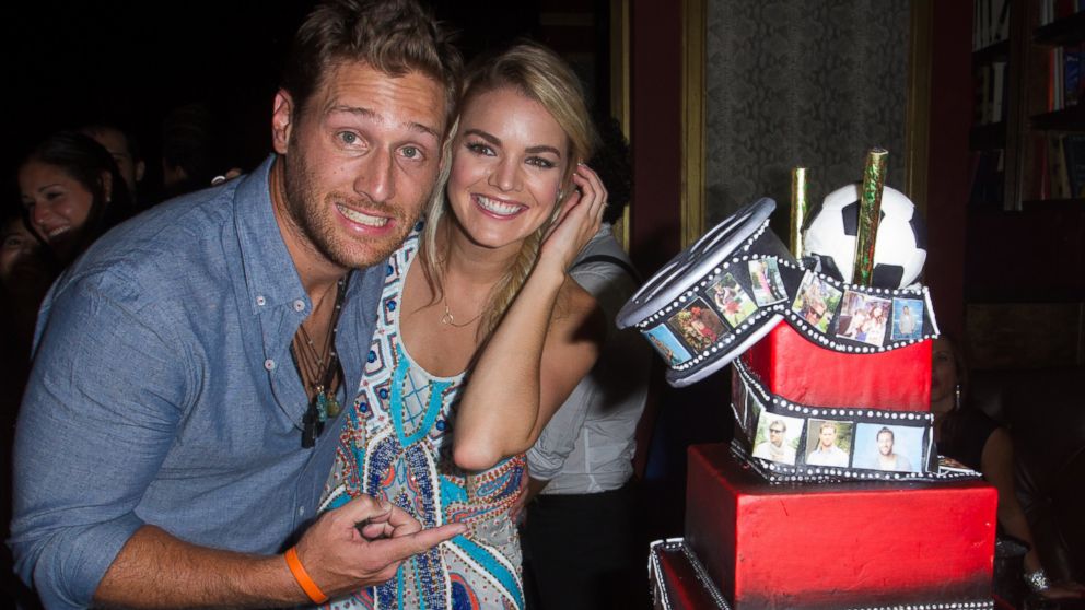 Juan Pablo Galavis and Nikki Ferrell pose with his birthday cake at his birthday party at Flamingo Theater Bar in Miami, Fla., Aug. 7, 2014.