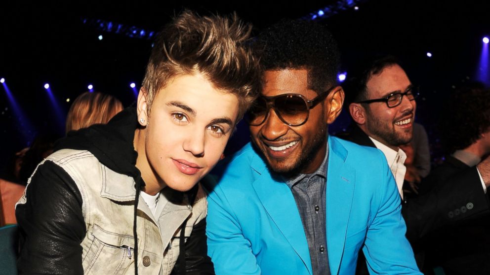 Singers Justin Bieber and Usher attend the 2012 Billboard Music Awards at the MGM Grand Garden Arena in this May 20, 2012, file photo in Las Vegas.   