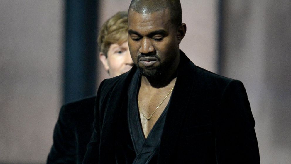 Winner for Album Of The Year Beck reacts as Kanye West leaves the stage at the 57th Annual Grammy Awards in Los Angeles, Feb. 8, 2015.