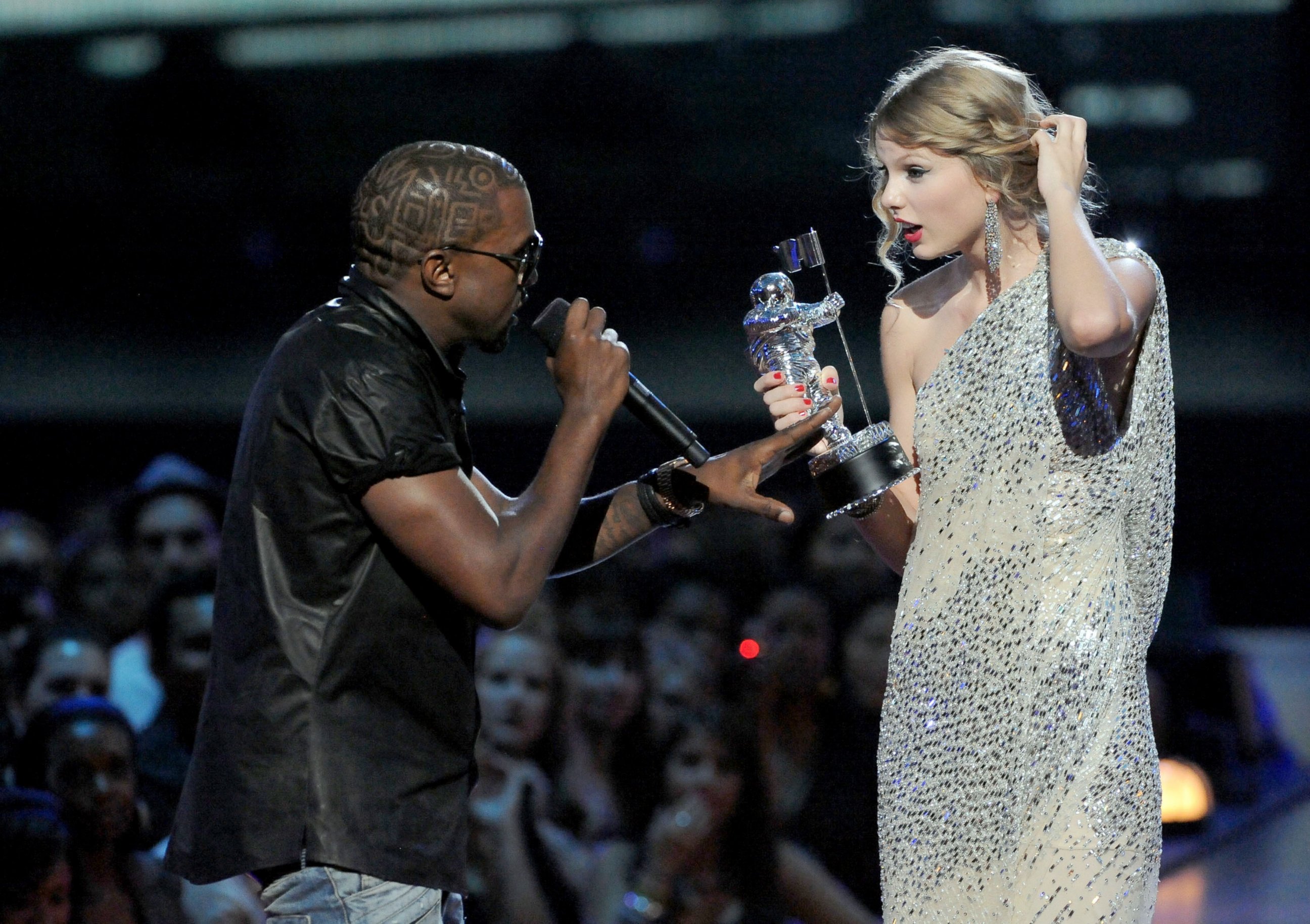 PHOTO: Kayne West jumps onstage as Taylor Swift accepts her award for the "Best Female Video" award during the 2009 MTV Video Music Awards at Radio City Music Hall, Sept. 13, 2009, in New York City.