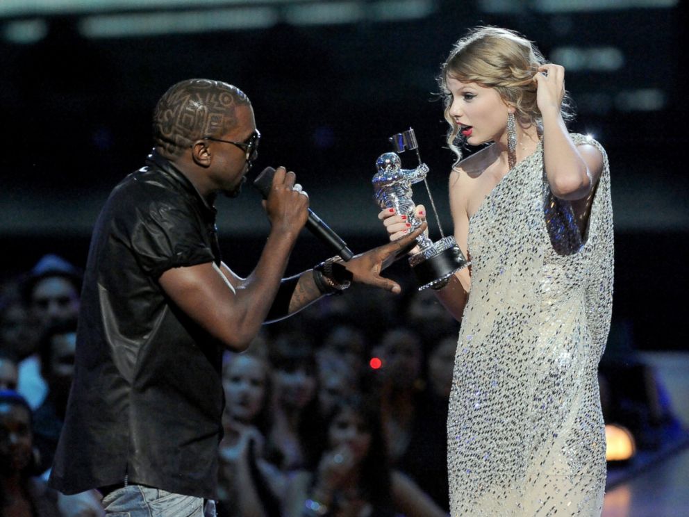 PHOTO: Kayne West jumps onstage as Taylor Swift accepts her award for the Best Female Video award during the 2009 MTV Video Music Awards at Radio City Music Hall, Sept. 13, 2009, in New York City.
