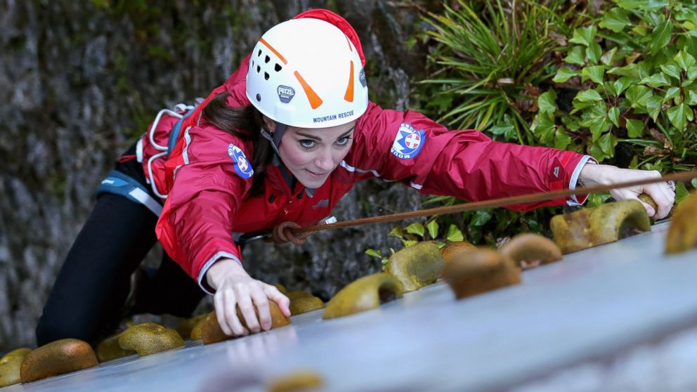 Catherine, Duchess of Cambridge ascends a climbing wall as she visits the Towers Residential Outdoor Education Center in Capel Curig, North Wales, Nov. 20, 2015. 