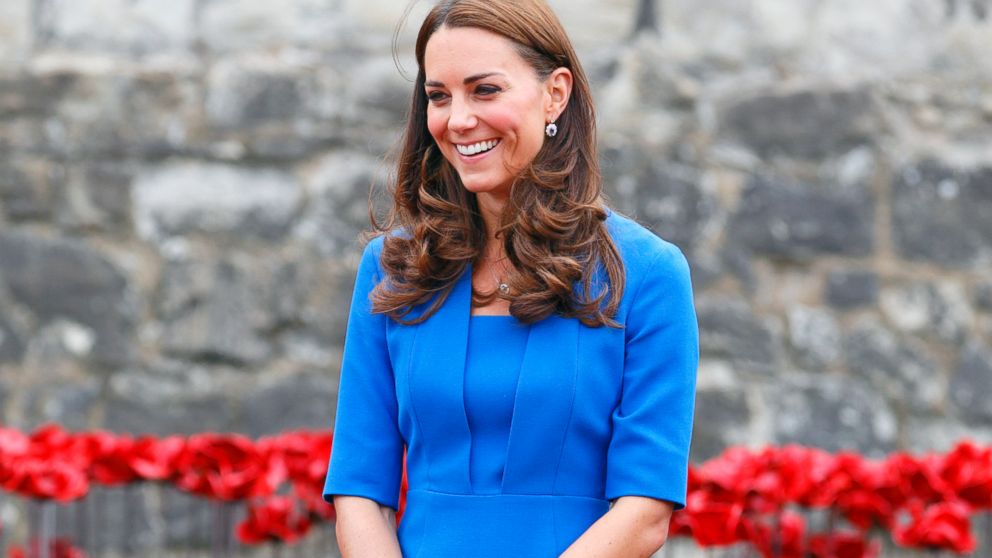  Catherine, Duchess of Cambridge, walks through a poppy field art installation entitled 'Blood Swept Lands and Seas of Red' by artist Paul Cummins, in the moat of the Tower of London, to commemorate the First World War, Aug. 5, 2014 in London.