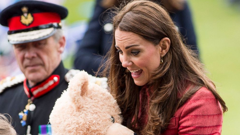 Catherine, Countess of Strathearn is presented with a teddy bear as she visits the newly restored MacRosty Park, Crieff, Perthshire on May 29, 2014 in Perth, United Kingdom.  