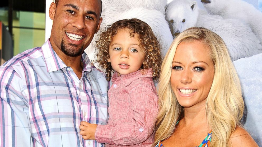PHOTO: Hank Baskett, Hank Baskett Jr. and Kendra Wilkinson attend the premiere of "To The Arctic" at California Science Center in Los Angeles, April 15, 2012.
