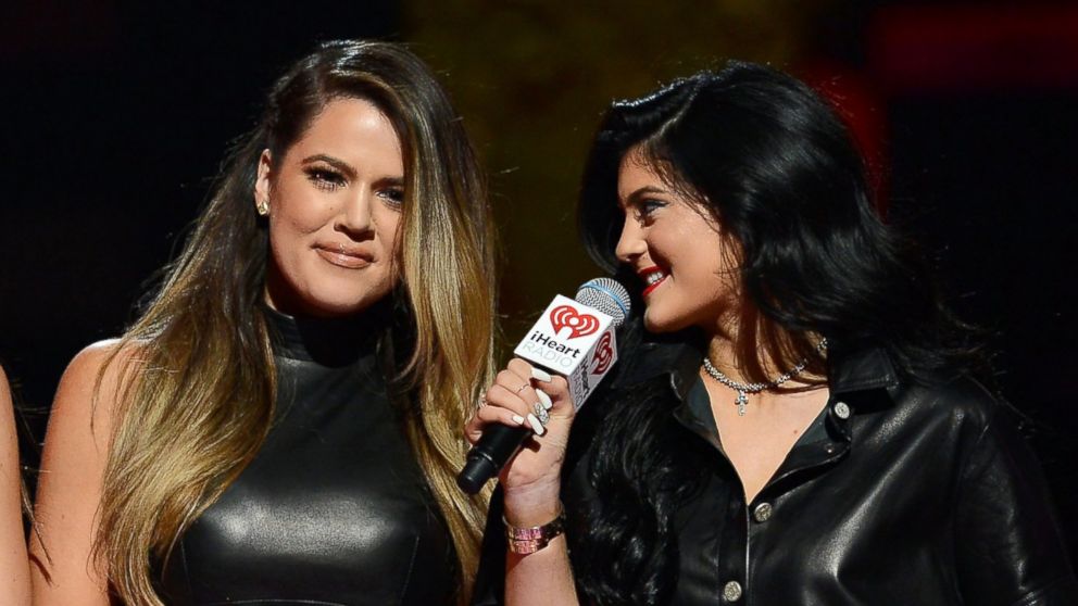 Khloe Kardashian and Kylie Jenner speak onstage during the iHeartRadio Music Festival at the MGM Grand Garden Arena, Sept. 21, 2013 in Las Vegas, Nev.