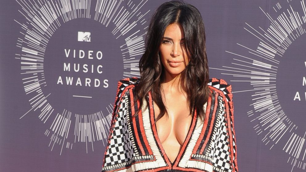 Kim Kardashian arrives at the 2014 MTV Video Music Awards at The Forum, Aug. 24, 2014, in Inglewood, Calif.