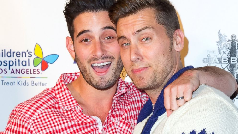 Actor Michael Turchin, left, and singer Lance Bass attend The Abbey's 8th annual Christmas In September Event benefiit, Sept. 24, 2013 in West Hollywood, Calif.
