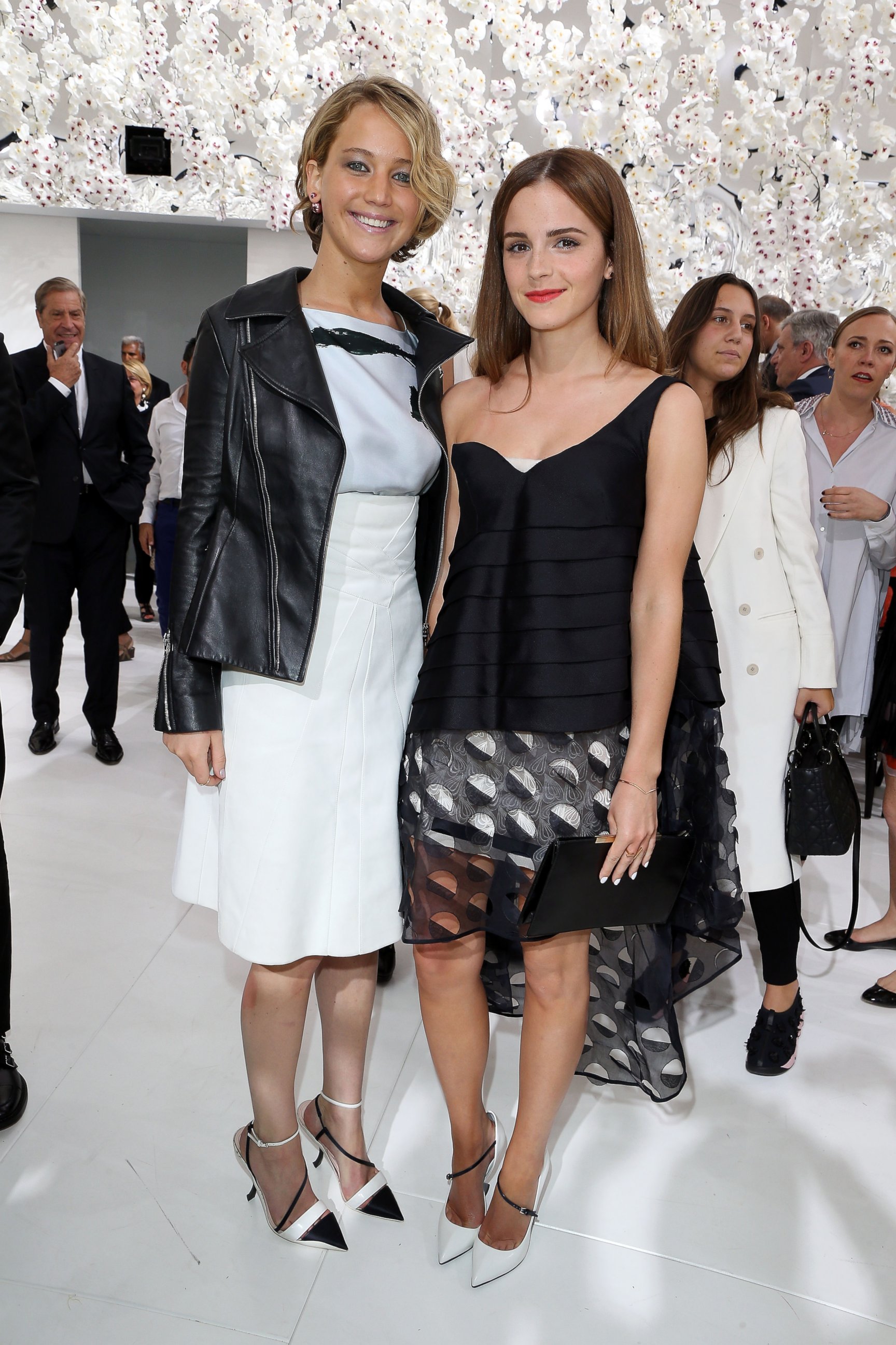 PHOTO: Jennifer Lawrence and Emma Watson attend the Christian Dior show as part of Paris Fashion Week - Haute Couture Fall/Winter 2014-2015 at Muse Rodin. July 7, 2014, in Paris.