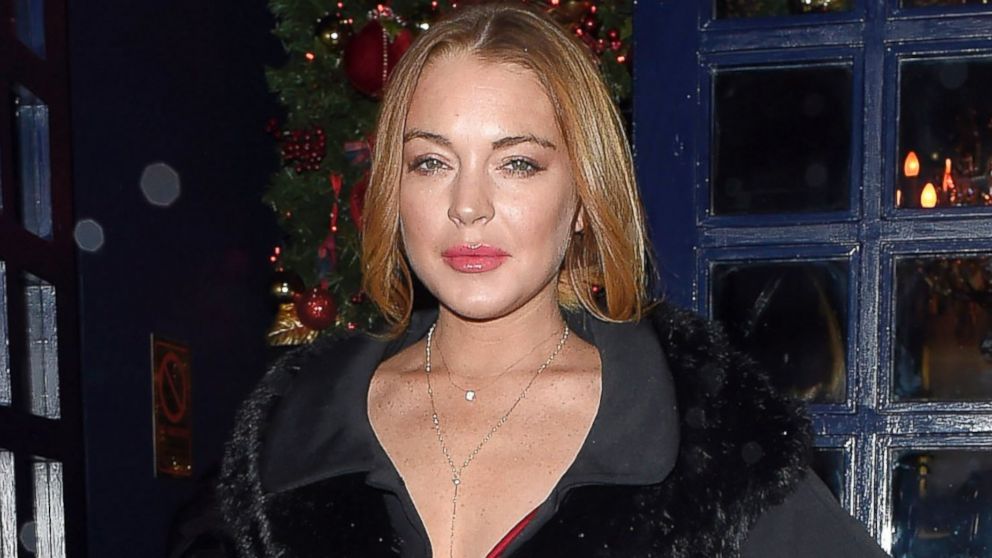 Lindsay Lohan attends The Sunday Times Christmas Party, Dec. 9, 2014, in London.