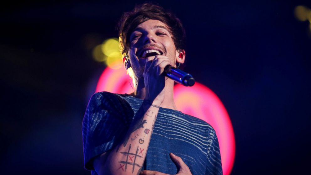 Louis Tomlinson of music group One Direction performs onstage  at the STAPLES CENTER on Dec. 4, 2015 in Los Angeles, California.
