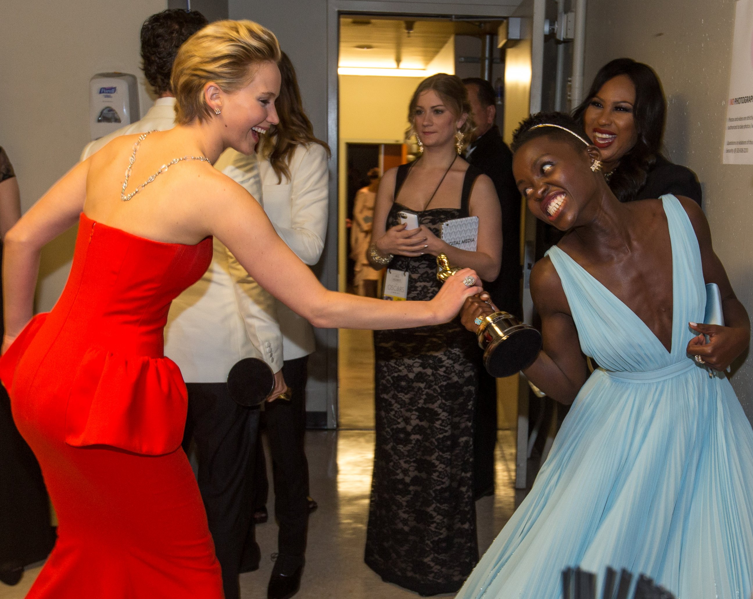 PHOTO: Jennifer Lawrence, left, is pictured with Lupita Nyong'o, right, backstage during the Oscars on Mar. 2, 2014 in Hollywood, Calif.  