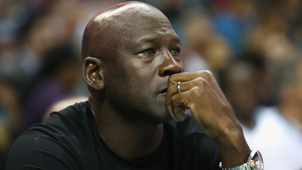 PHOTO: Owner of the Charlotte Hornets, Michael Jordan, watches during their game against the Atlanta Hawks at Time Warner Cable Arena, Nov. 1, 2015 in Charlotte, North Carolina.