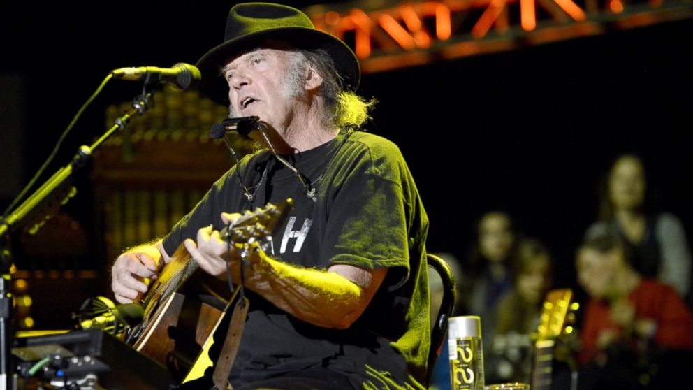 Neil Young performs during the 28th annual Bridge School Benefit at Shoreline Amphitheatre, Oct. 26, 2014, in Mountain View, Calif.