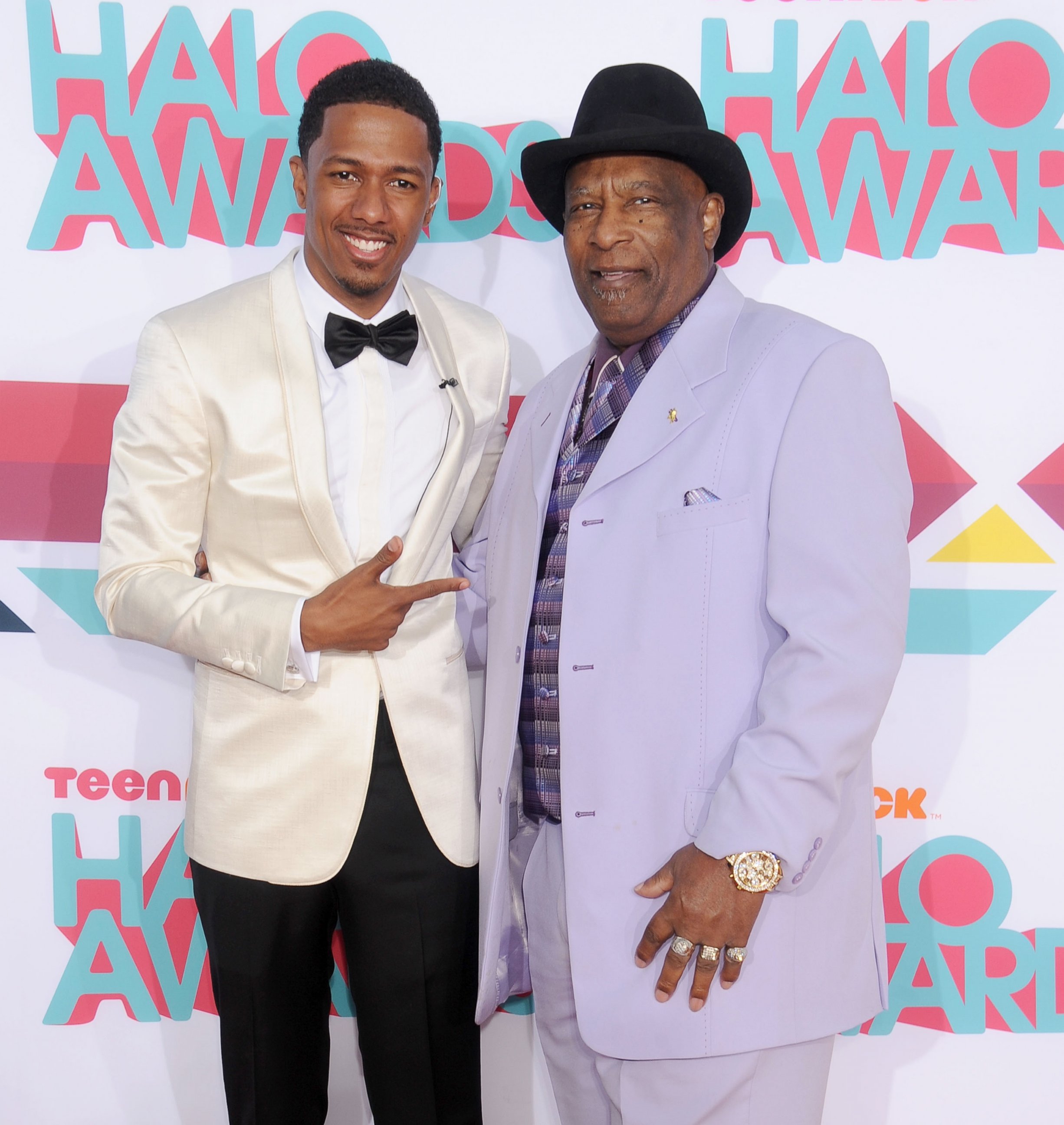 PHOTO: Nick Cannon and grandfather James Cannon Sr. arrive at the 2013 TeenNick HALO Awards at the Hollywood Palladium, Nov. 17, 2013, in Hollywood, Calif.