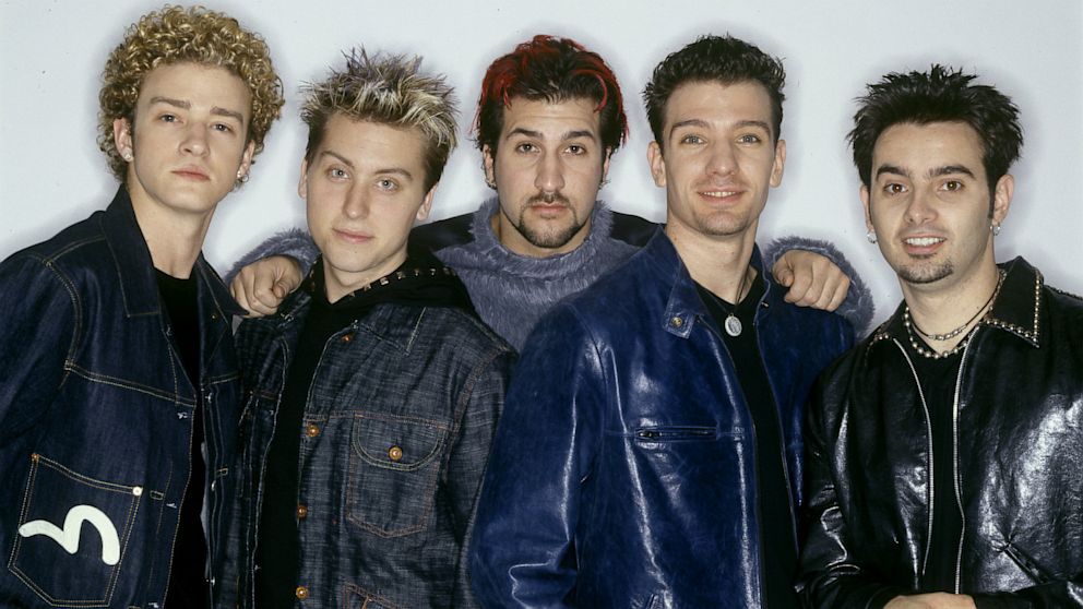 Justin Timberlake, Lance Bass, Joey Fatone, JC Chasez and Chris Kirkpatrick of Nsync pose for a photoshoot in New York City, Oct. 27, 1999. (Photo by L. Busacca/WireImage) 