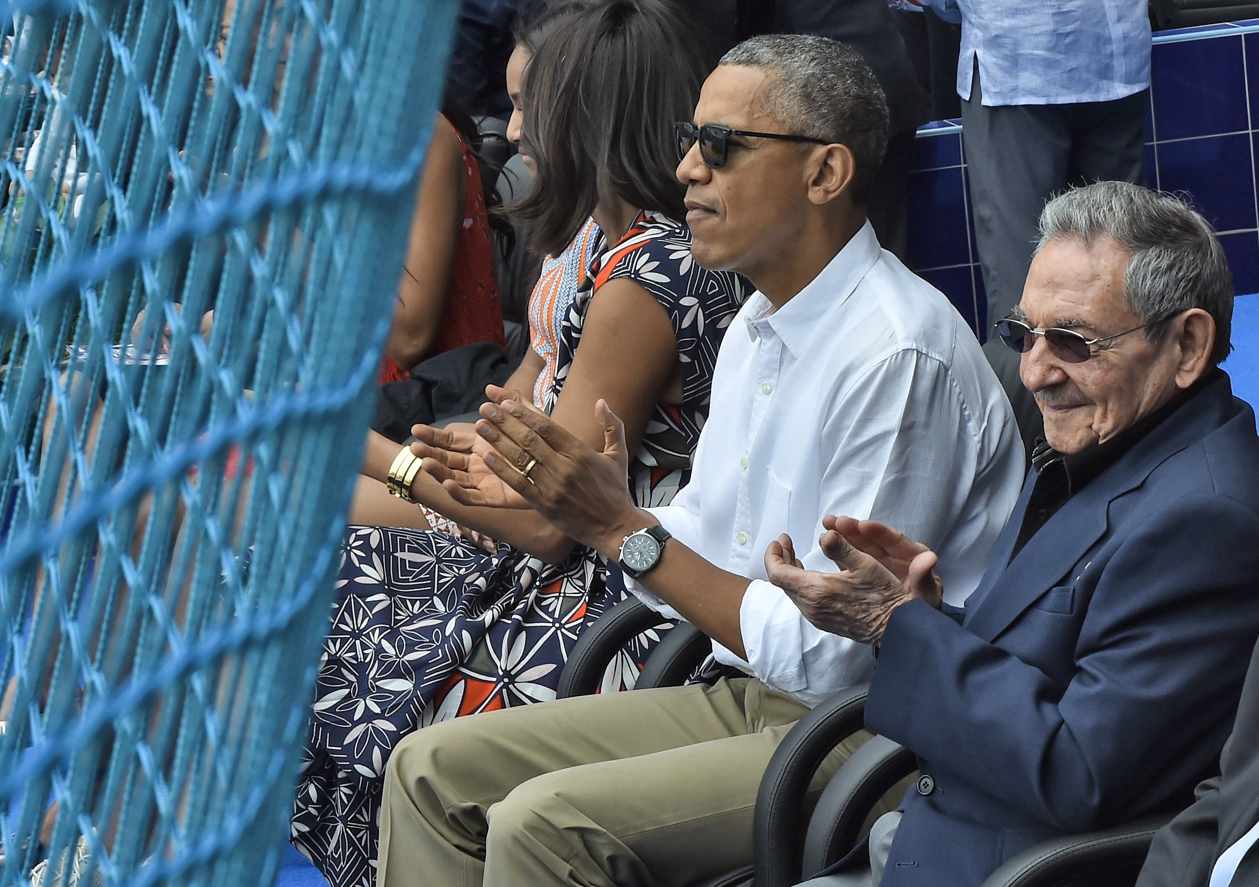 PHOTO: President Barack Obama and Cuban President Raul Castro applaud during a Major League baseball exhibition game between the Tampa Bay Rays and the Cuban national team at the Latinoamericano stadium in Havana, March 22, 2016. 
