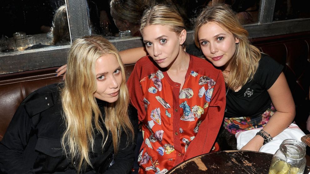 Mary-Kate Olsen, Ashley Olsen and Elizabeth Olsen attend the NYLON & AX Armani Exchange Private Dinner for the October issue with cover star Lizzie Olsen, Oct. 5, 2011 in New York City.