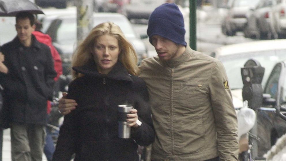 PHOTO: Gwyneth Paltrow, left, walks with Chris Martin, right, on Feb. 23, 2003 in New York City. 