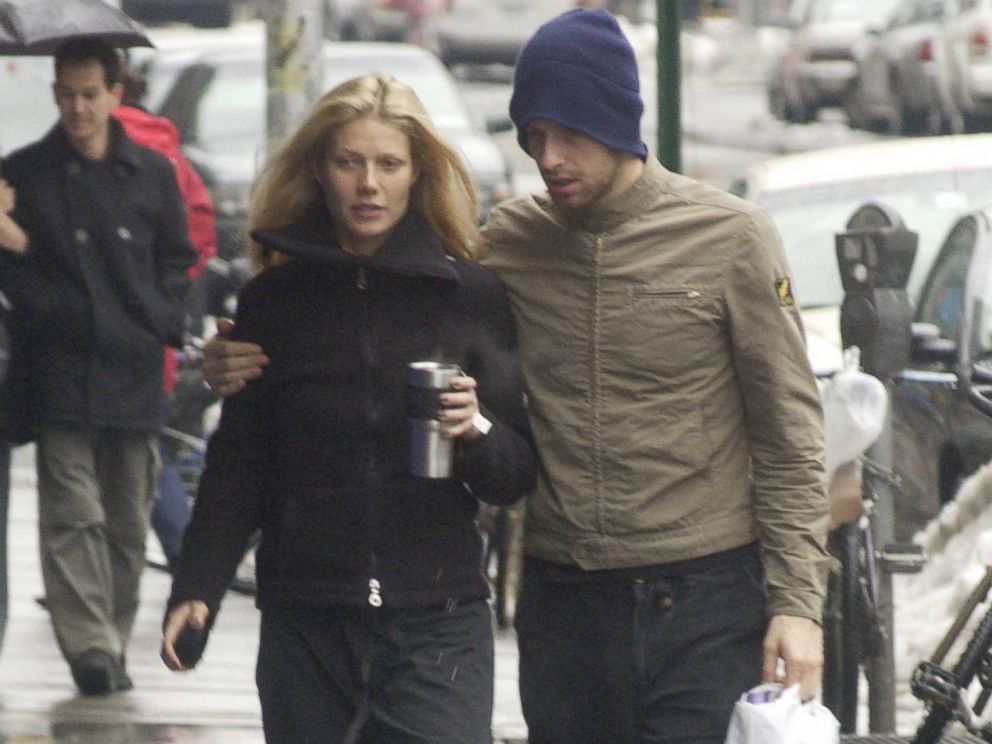 PHOTO: Gwyneth Paltrow, left, walks with Chris Martin, right, on Feb. 23, 2003 in New York City.