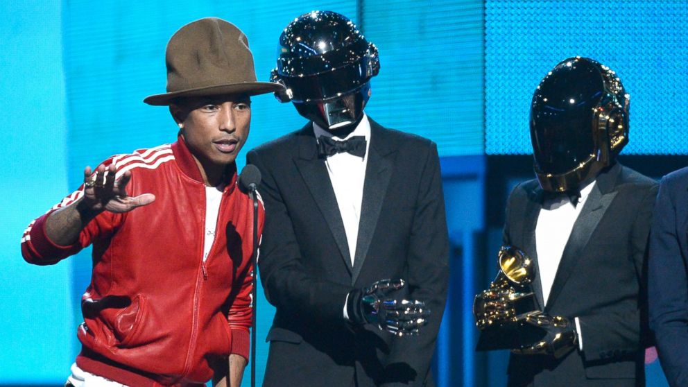 From left, Pharrell Williams is pictured with Thomas Bangalter and Guy-Manuel de Homem-Christo of Daft Punk during the 56th GRAMMY Awards on Jan. 26, 2014 in Los Angeles, Calif. 