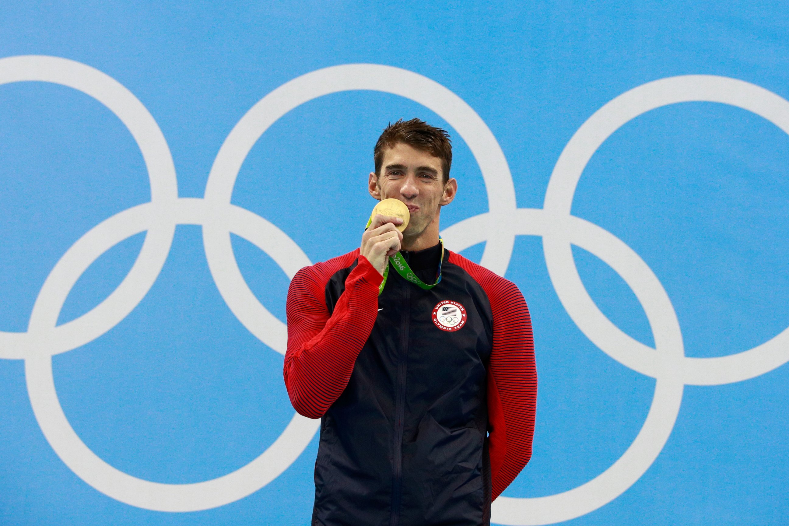 PHOTO: Gold medalist Michael Phelps of the United States celebrates on the podium during the medal ceremony for the Men's 200m Individual Medley Final on Day 6 of the Rio 2016 Olympic Games, Aug. 11, 2016, in Rio de Janeiro, Brazil. 