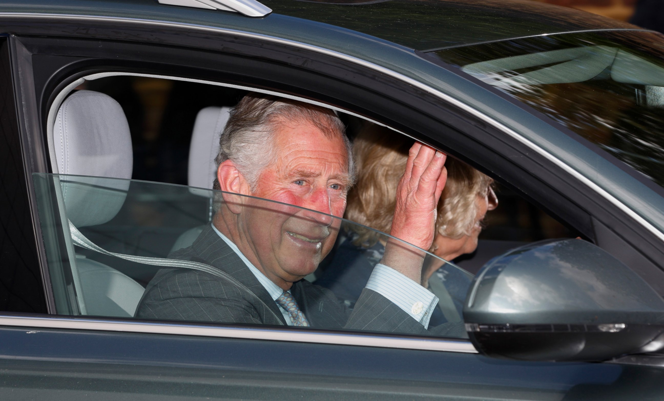 PHOTO: Prince Charles, Prince of Wales and Camilla, Duchess of Cornwall leave Kensington Palace after visiting their newborn granddaughter on May 3, 2015 in London, England. 