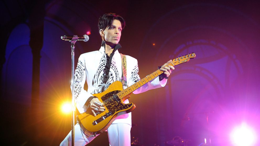 In this file photo, Prince performs at the Grand Palais in Paris, Oct. 11, 2009.